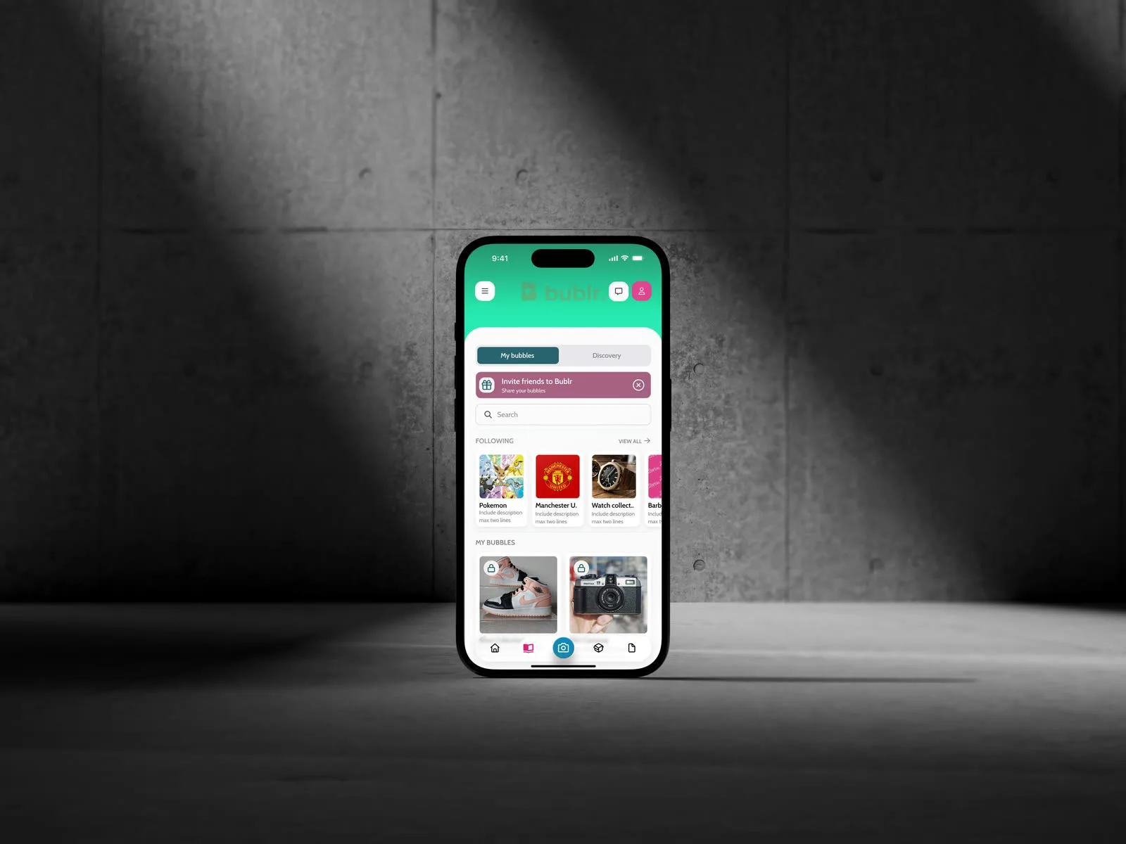 A phone standing in a concrete alcove showing the My Bubbles home screen of the Bublr app