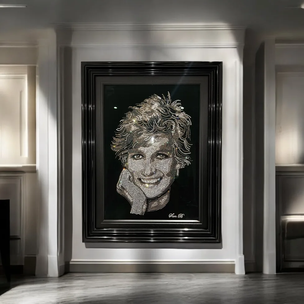 Princess Diana in crystal, framed on a white panelled wall