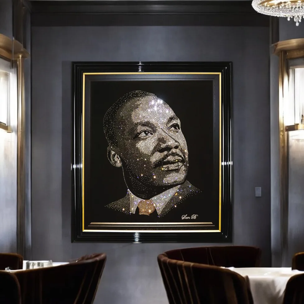 Martin Luther King Jr in crystal, framed on a grey wall in a dining room
