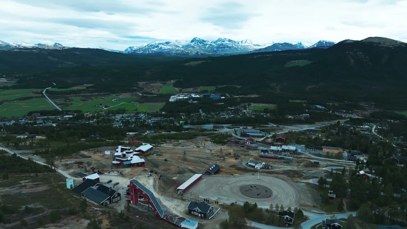 The town in the valley from the air, the works in the foreground