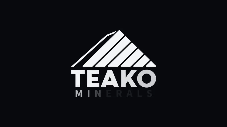The Teako mark on the dark ground, lit at its peak