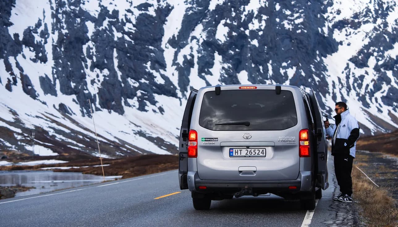 The shoot’s van pulled over on the mountain pass, snow on the flanks either side