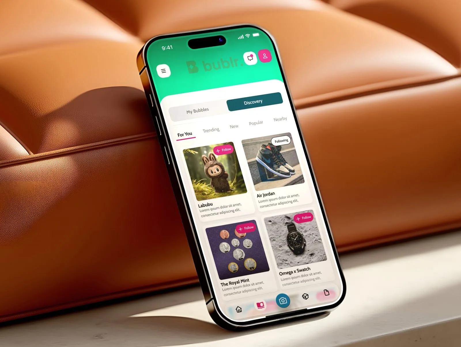 A phone standing on tan leather showing the Discovery screen of the Bublr app